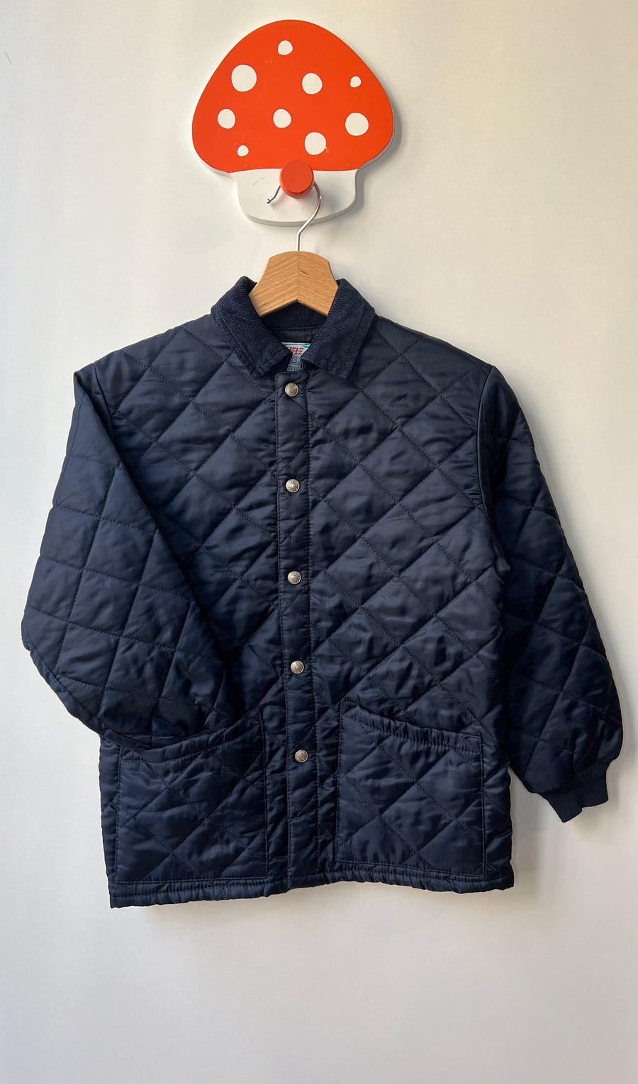 Veste matelassée bleue - 7/8 ans